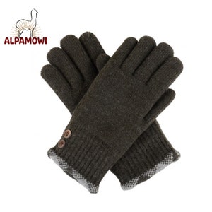 May include: A pair of dark green knitted gloves with a white trim and two brown buttons on the cuff.