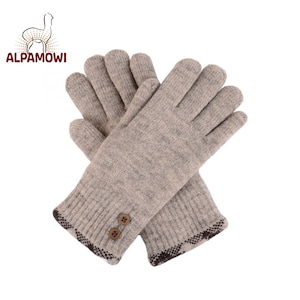 May include: A pair of gray knitted gloves with brown trim and two buttons on the cuff.