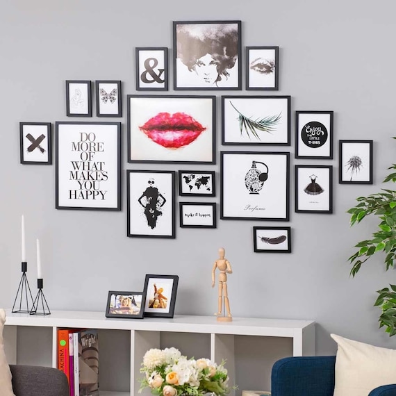 Multiple picture 2024 frames on wall