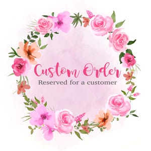 May include: A pink floral wreath with the text "Custom Order Reserved for a customer" in the center.