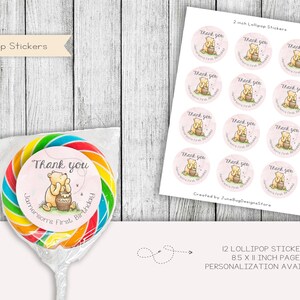 May include: Twelve 2-inch round lollipop stickers featuring Winnie the Pooh and a honey pot. The stickers are pink with white text that says "Thank you" and "Jamerson's First Birthday".