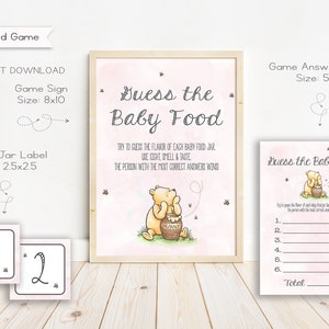 May include: A baby shower game set with a Winnie the Pooh theme. Includes a sign, answer card, and table labels. The sign says "Guess the Baby Food" with instructions. The answer card is 5x7 inches.