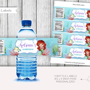 May include: Four printable water bottle labels featuring a mermaid with red hair and a purple tail. The labels are decorated with sea life and bubbles. The text on the labels reads "Audrinna's 5th Birthday".