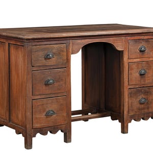 May include: A rectangular wooden desk featuring a dark brown finish with a visible wood grain. The desk includes six drawers, three on each side, each equipped with a dark metal cup-style pull handle. The base has a scalloped edge design.
