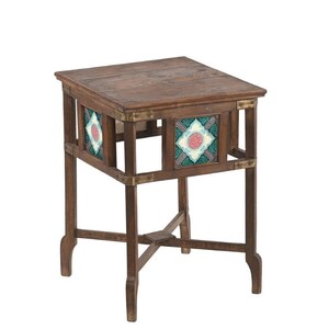 May include: A square wooden side table with a dark brown finish, featuring four straight legs connected by an X-shaped stretcher. The upper frame is accented with brass corner brackets and square decorative tiles displaying a teal, white, and pink pattern.