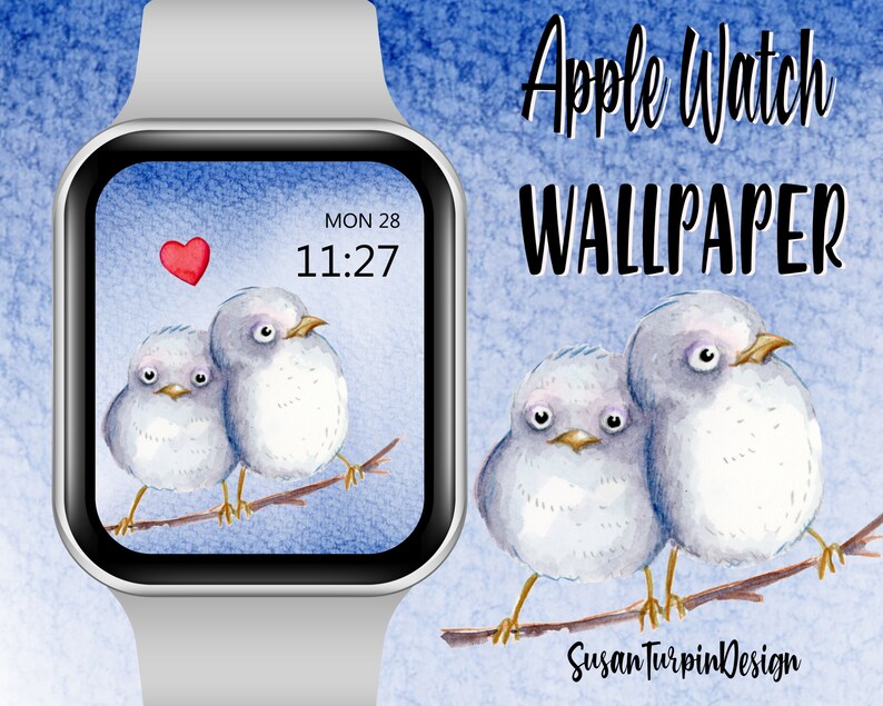 May include: Apple Watch wallpaper featuring two watercolor painted birds perched on a branch. The birds are light blue and white with large eyes. The background is a light blue watercolor wash. The watch face shows the time 11:27 and the date MON 28. The text "Apple Watch WALLPAPER" is at the top of the image. The text "Susan Turpin Design" is at the bottom of the image.