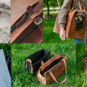 May include: A brown leather pet carrier with a zip closure and a mesh window. The carrier has a handle and a shoulder strap. A cat is visible inside. The carrier is made of a durable leather material.