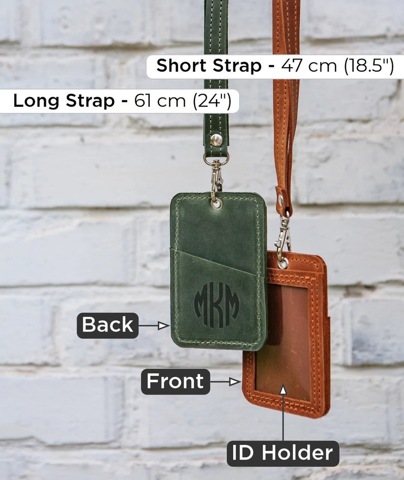 May include: Two leather ID badge holders with straps. The green holder has a monogram "MKM" on the front and a pocket on the back. The brown holder has a clear plastic window on the front. The straps are 47 cm (18.5 inches) and 61 cm (24 inches) long.