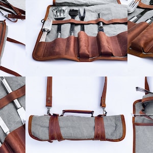 May include: A brown leather grilling tool roll with a gray canvas lining. The roll has a zipper closure and a handle. It is open to reveal a set of grilling tools, including a spatula, tongs, a fork, and a brush.