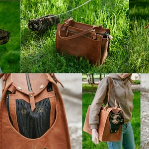 May include: A brown leather pet carrier with a cat visible. The carrier is rectangular with a handle and a zipped top. The cat carrier is designed for small pets and is made of durable leather.