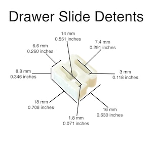 May include: Diagram of a drawer slide detent with measurements in millimeters and inches. The detent is a white plastic piece with two slots and a raised lip.