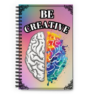 May include: Spiral-bound notebook with a colourful design. The cover features a split brain illustration, one side sketched in grey, the other bursting with vibrant colours. The words "BE CREATIVE" are prominently displayed above the brain graphic.