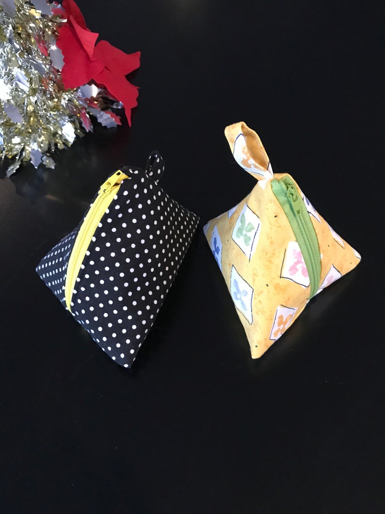 Triangle pyramid zipper pouch for coins earphones chargers etc; no raw edges exposed inside