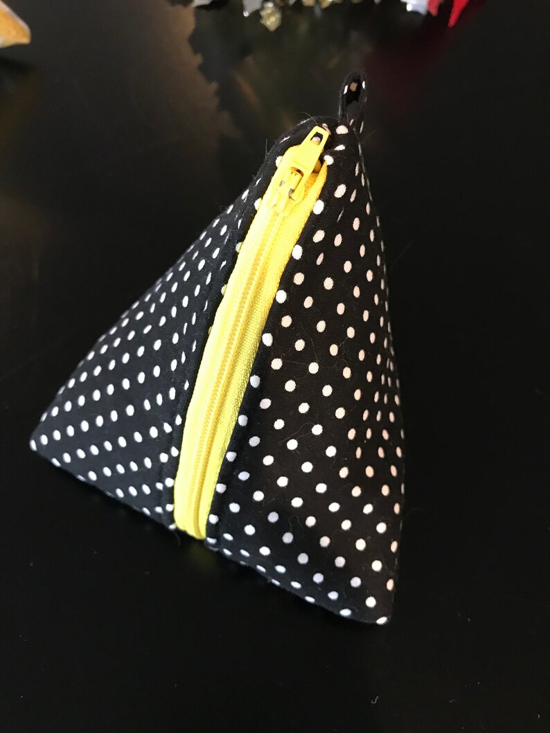 Triangle pyramid zipper pouch for coins earphones chargers etc; no raw edges exposed inside
