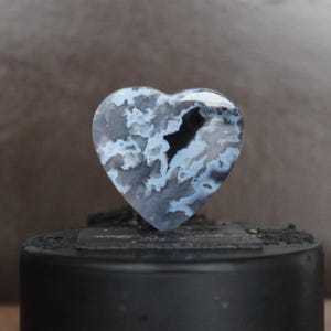 Plume agate cabochon
