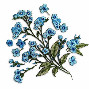 May include: Embroidered blue forget-me-not flower patches with green leaves and stems. The floral patches are in various sizes and shapes, ideal for crafting and embellishments.