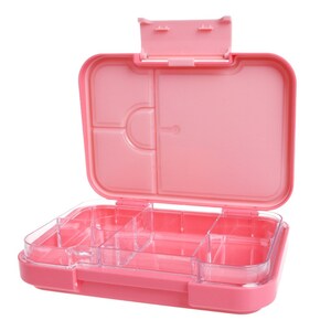 May include: Pink plastic lunch box with multiple compartments. The lid is open and the box has a clear plastic insert with multiple sections.