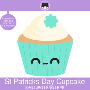 May include: A green cupcake with white frosting and a shamrock on top. The cupcake has a happy face with pink cheeks. The text "St Patricks Day Cupcake" is below the cupcake.