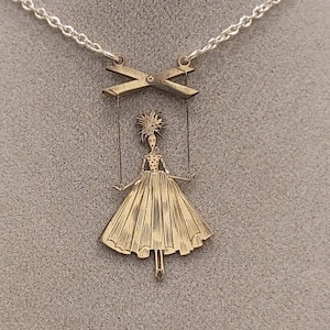 Collier à pendentif marionnette en argent