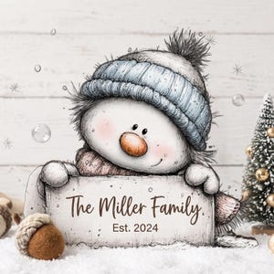 May include: A whimsical illustration of a snowman wearing a light blue knit hat and scarf, holding a rectangular sign that reads The Miller Family Est. 2024. The snowman has a round orange nose and rosy cheeks, rendered in a sketch-like artistic style.