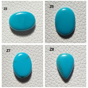 May include: Four turquoise cabochons, labeled Z5, Z6, Z7, and Z8. The stones are oval, oval, oval, and teardrop shaped, respectively.