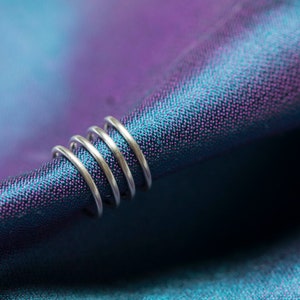 Four hooped ear cuff with a brush matte texture / mirror finish. Contemporary, minimalist, sleek! Adjustable, no piercing needed!