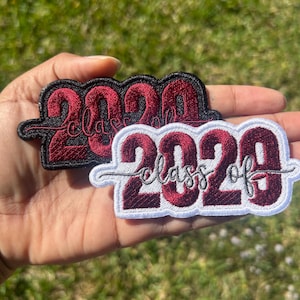 May include: Two embroidered patches with the text "Class of 2020" in red lettering. One patch is black with white lettering and the other is white with black lettering.