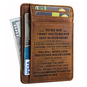 May include: Brown leather wallet with a message engraved on the front that reads "To my son, I want you to believe deep in your heart..." The wallet has a card slot and a money clip.
