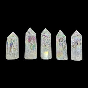 May include: Five iridescent clear quartz crystal points, each with a unique pattern of rainbow colors. The points are arranged in a row on a black background.