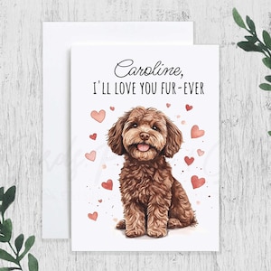 May include: A greeting card with a watercolor illustration of a brown dog with pink hearts. The card reads "Caroline, I'll love you fur-ever".