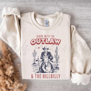 Ridin With The Outlaw And The Hillbilly Trump Sweatshirt 2024, Outlaw President Longsleeve, Western Trump Vance Cowboy Shirt, Elect Red Tee