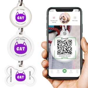 May include: Three white pet ID tags with a purple cat silhouette and the text "PET NAME" and "PHONE NUMBER". The tags are shown with a smartphone displaying a QR code with the text "ScanQR", "animal-id.net", and "A7336".