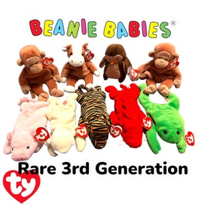 May include: A collection of nine rare 3rd generation Beanie Babies. The plush toys include a monkey, cow, owl, monkey, pig, lamb, tiger, lobster, and frog. The toys are all in various colours and have the signature red and white Ty heart tag.