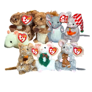 May include: A collection of Ty Beanie Babies plush toys, including squirrels and mice. The plush toys are in various colors, including brown, gray, and white. Some toys have holiday-themed accessories like a wreath or a candle.