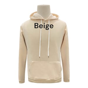 May include: Beige hooded sweatshirt with a kangaroo pocket and white drawstrings.