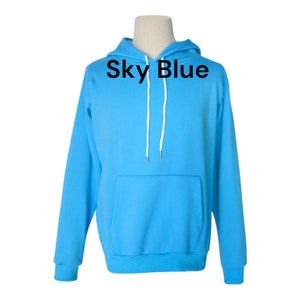 May include: A sky blue hooded sweatshirt with white drawstrings. The text "Sky Blue" is printed on the front of the sweatshirt.