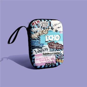 May include: A rectangular, zippered pouch with a black handle. The pouch is covered in a collage of text and graphics in various colors, including blue, white, pink, and black. The word "ECHO" is prominently displayed.