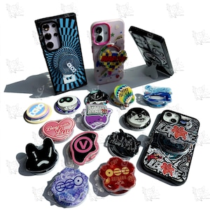 Soporte acrílico para teléfono con agarre – Diseños inspirados en el K-Pop (Reserva)