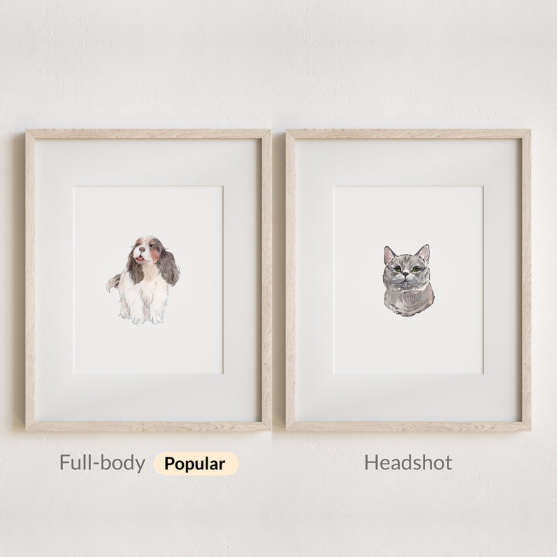 May include: Two framed prints featuring watercolor illustrations of pets. The left frame displays a full-body Cavalier King Charles Spaniel, labeled Full-body Popular. The right frame shows a gray cat headshot, labeled Headshot.