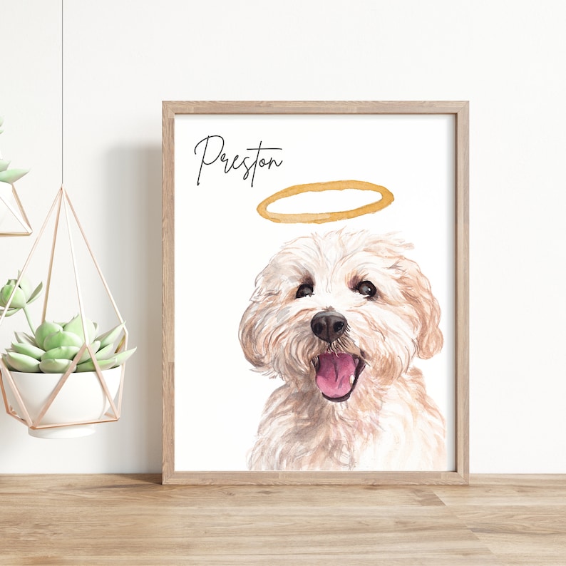 May include: A watercolor painting of a white dog with a halo above its head. The dog is smiling and has its tongue sticking out. The painting is titled "Preston".