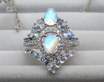 Large Teardrop Moonstone Diamond Halo with Blue Sapphire Contour Wedding Band