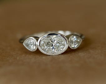 1.56ct Genuine Oval with Pear Diamond Minimalist Bezel Ring