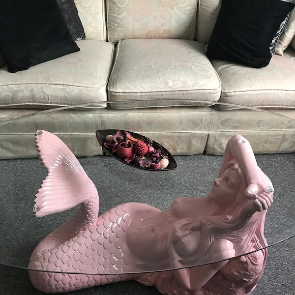 Coffee table laying mermaid pink