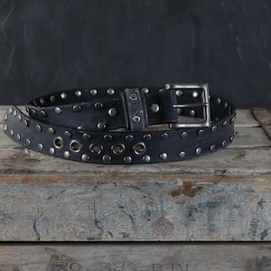 Distressed Leather Belt Studded. Grommets accent 1.5 inches wide. BLACK
