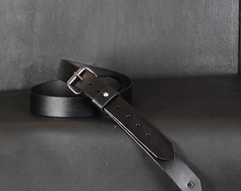 Slim Leather Guitar Strap. 1.5 inches wide. Buckle design. Black & Antique Nickel