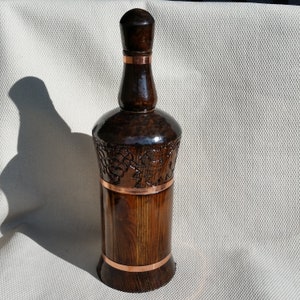 750ml. Wooden  Carved Glass Bottle