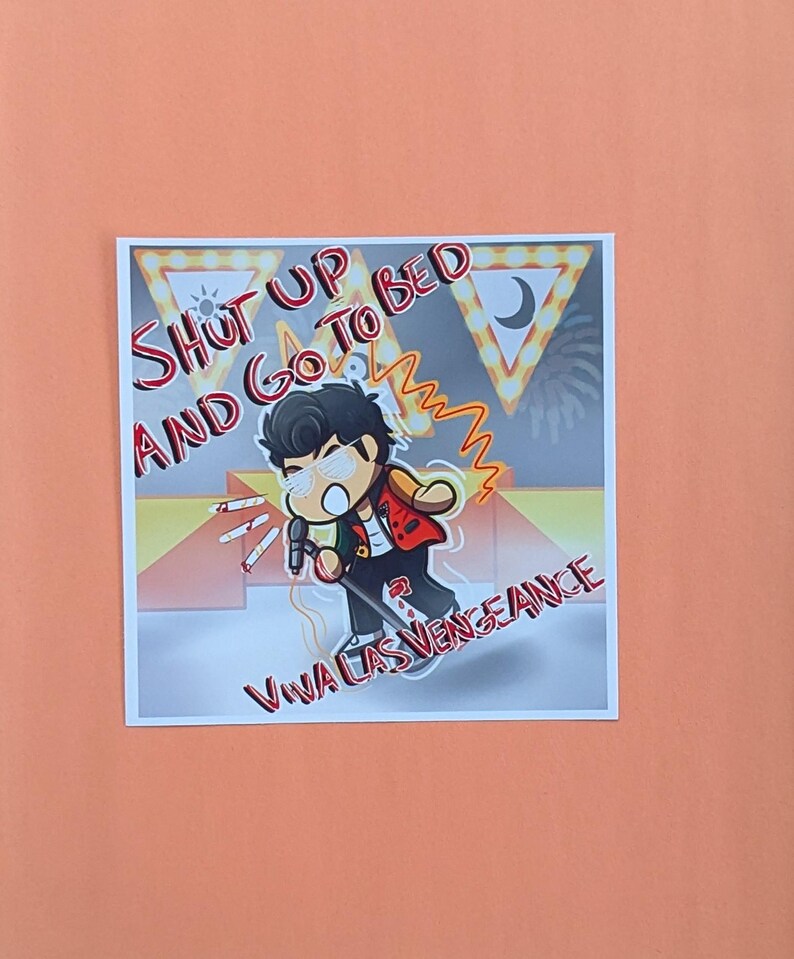 May include: Square sticker with a cartoon illustration of a person holding a microphone, with the text "Shut Up and Go To Bed" and "Viva Las Vengeance". The character is wearing a red jacket and black pants. The background is a mix of yellow, orange, and gray.