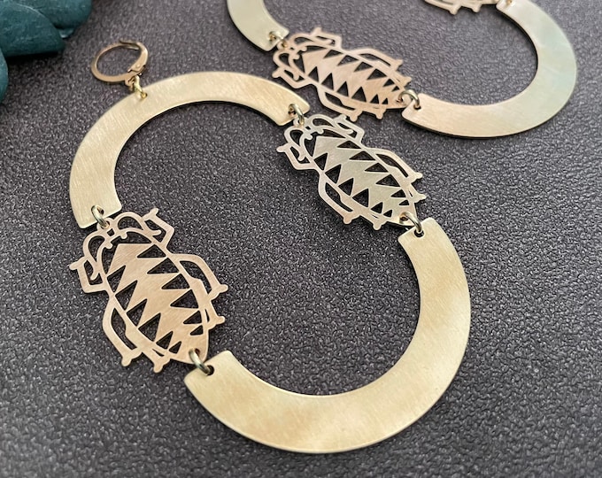 ryein - brass scarab arch earrings