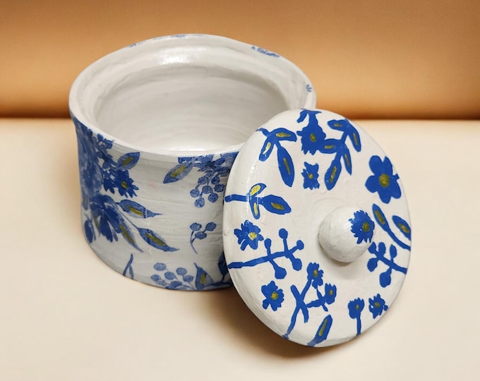 Handmade and hand painted clay trinket jar.