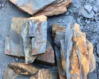 Large box. 10lbs. Rust colored slate stone for mosaic or crafts.